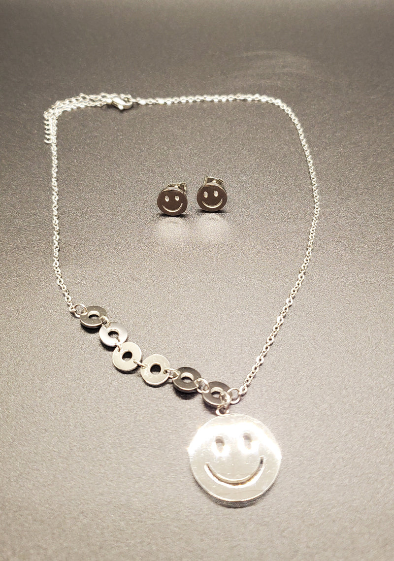 Cadena con medalla Happy Face & aretes