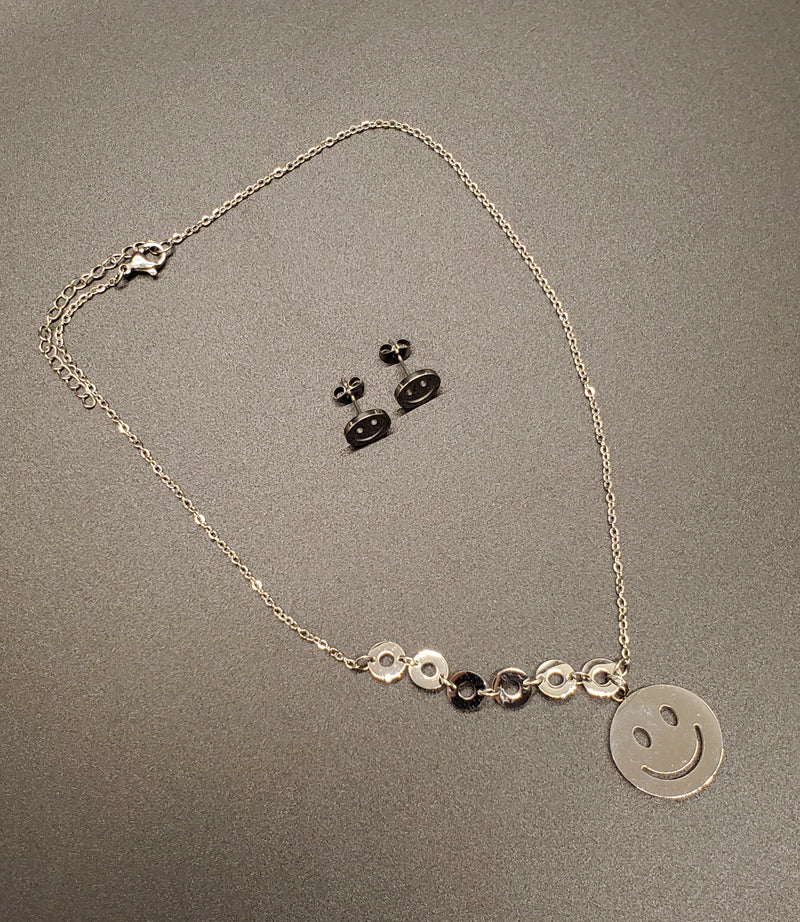 Cadena con medalla Happy Face & aretes